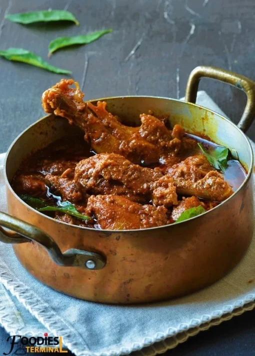 South Indian chicken madras curry with red chili and coconut